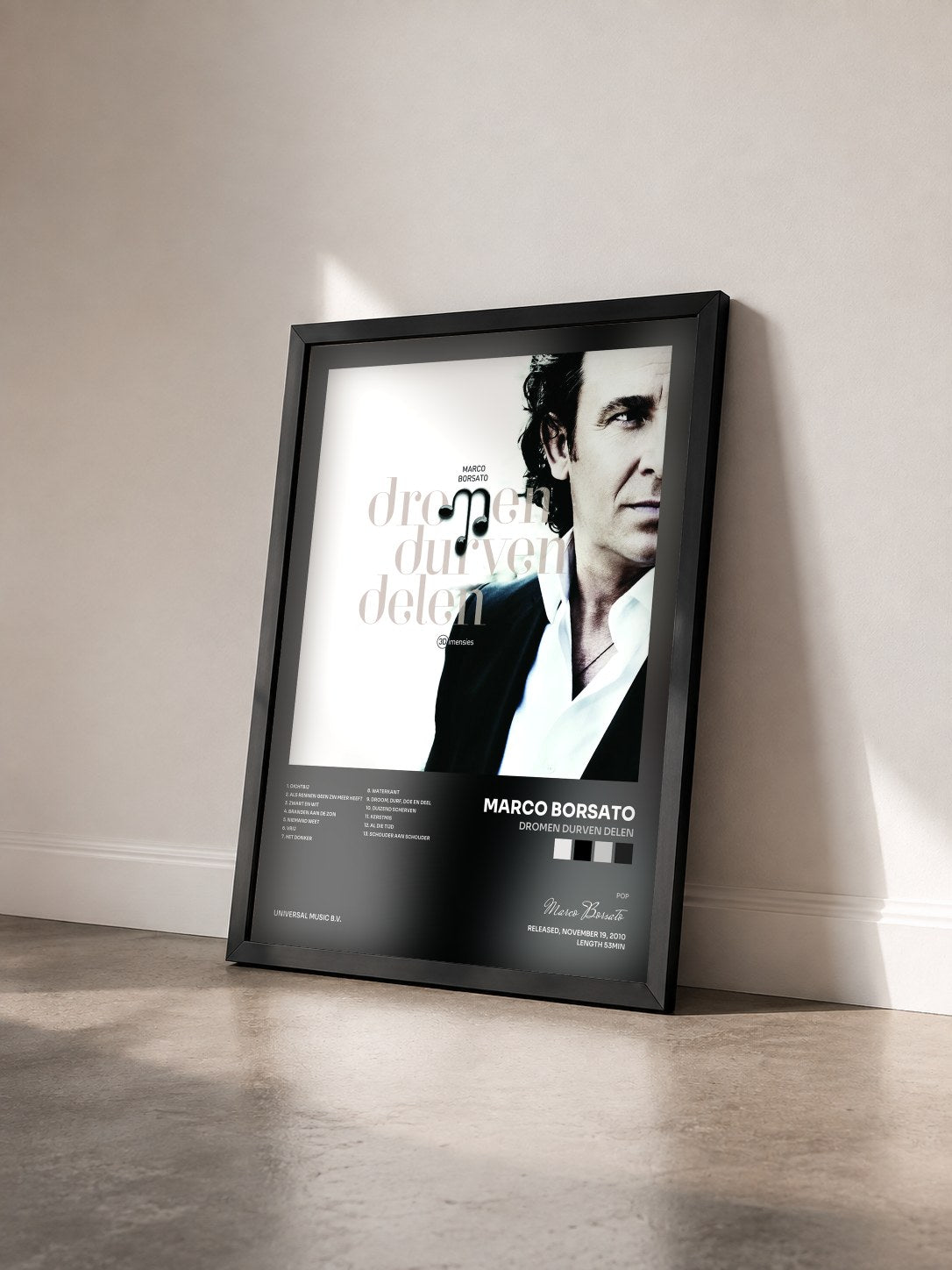 #noir Tableau de l'album Dromen Durven Delen de Marco Borsato vu de trois quarts, cadre noir