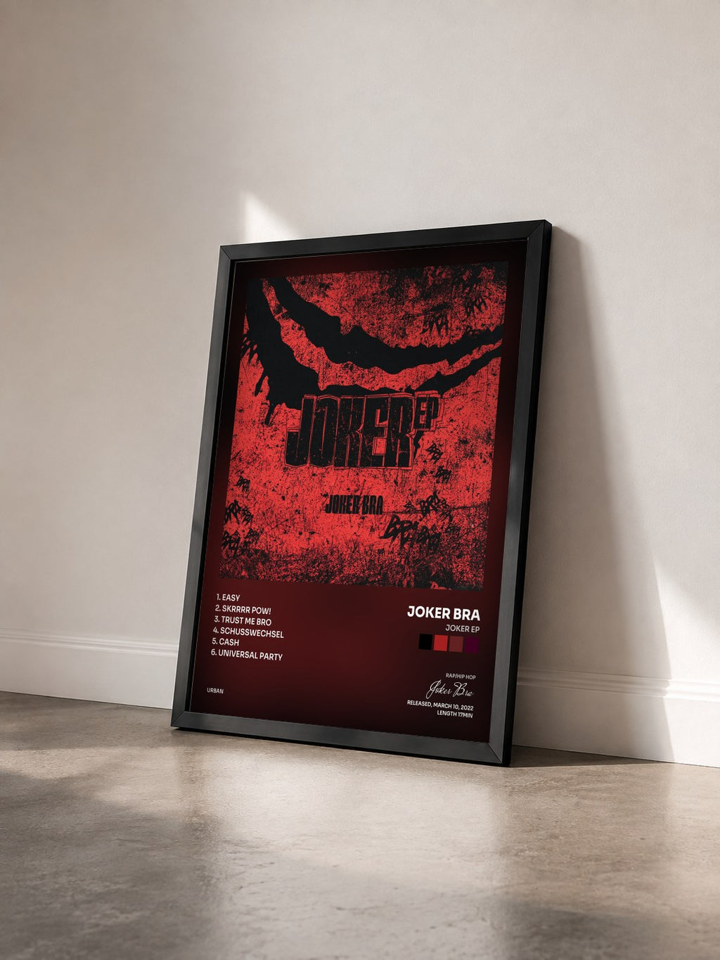 #noir Tableau de l'album JOKER EP de Joker Bra vu de trois quarts, cadre noir