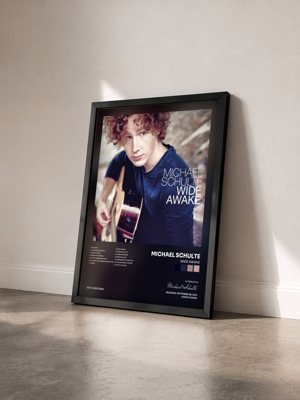 #noir Tableau de l'album Wide Awake de Michael Schulte vu de trois quarts, cadre noir
