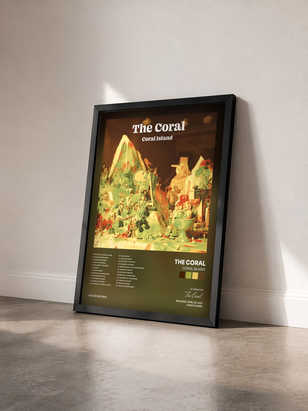 #noir Tableau de l'album Coral Island de The Coral vu de trois quarts, cadre noir