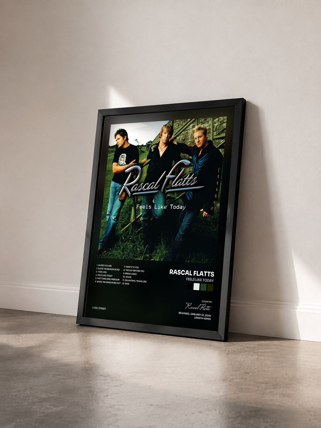 #noir Tableau de l'album Feels Like Today de Rascal Flatts vu de trois quarts, cadre noir