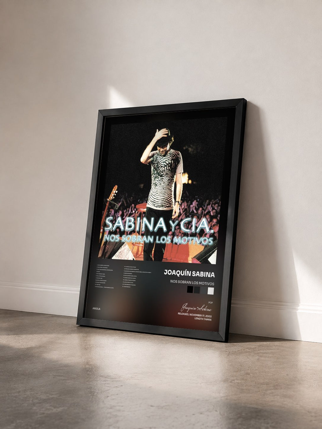 #noir Tableau de l'album Nos Sobran Los Motivos de Joaquín Sabina vu de trois quarts, cadre noir