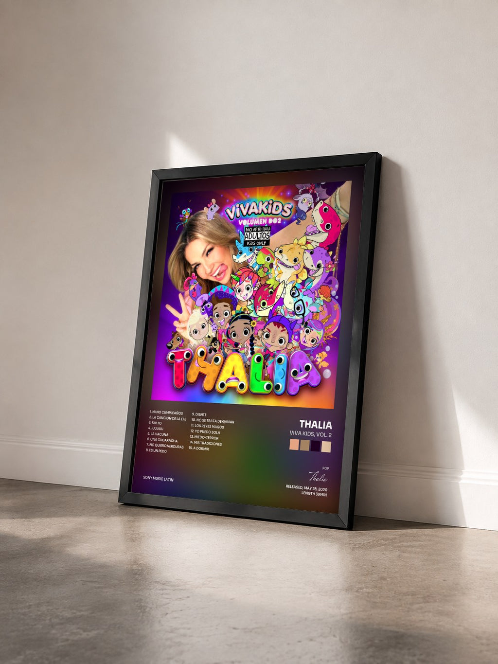 #noir Tableau de l'album Viva Kids, Vol. 2 de Thalia vu de trois quarts, cadre noir