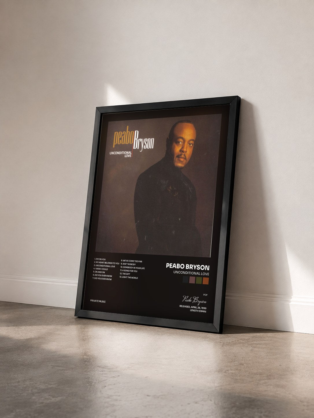 #noir Tableau de l'album Unconditional Love de Peabo Bryson vu de trois quarts, cadre noir