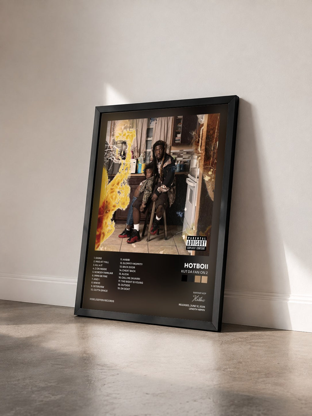 #noir Tableau de l'album Kut Da Fan On 2 de Hotboii vu de trois quarts, cadre noir