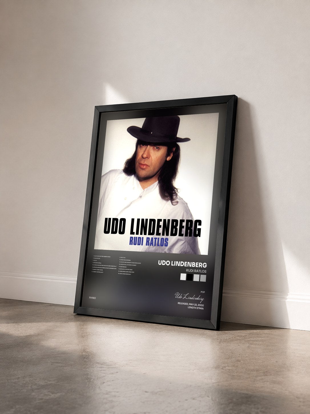 #noir Tableau de l'album Rudi Ratlos de Udo Lindenberg vu de trois quarts, cadre noir