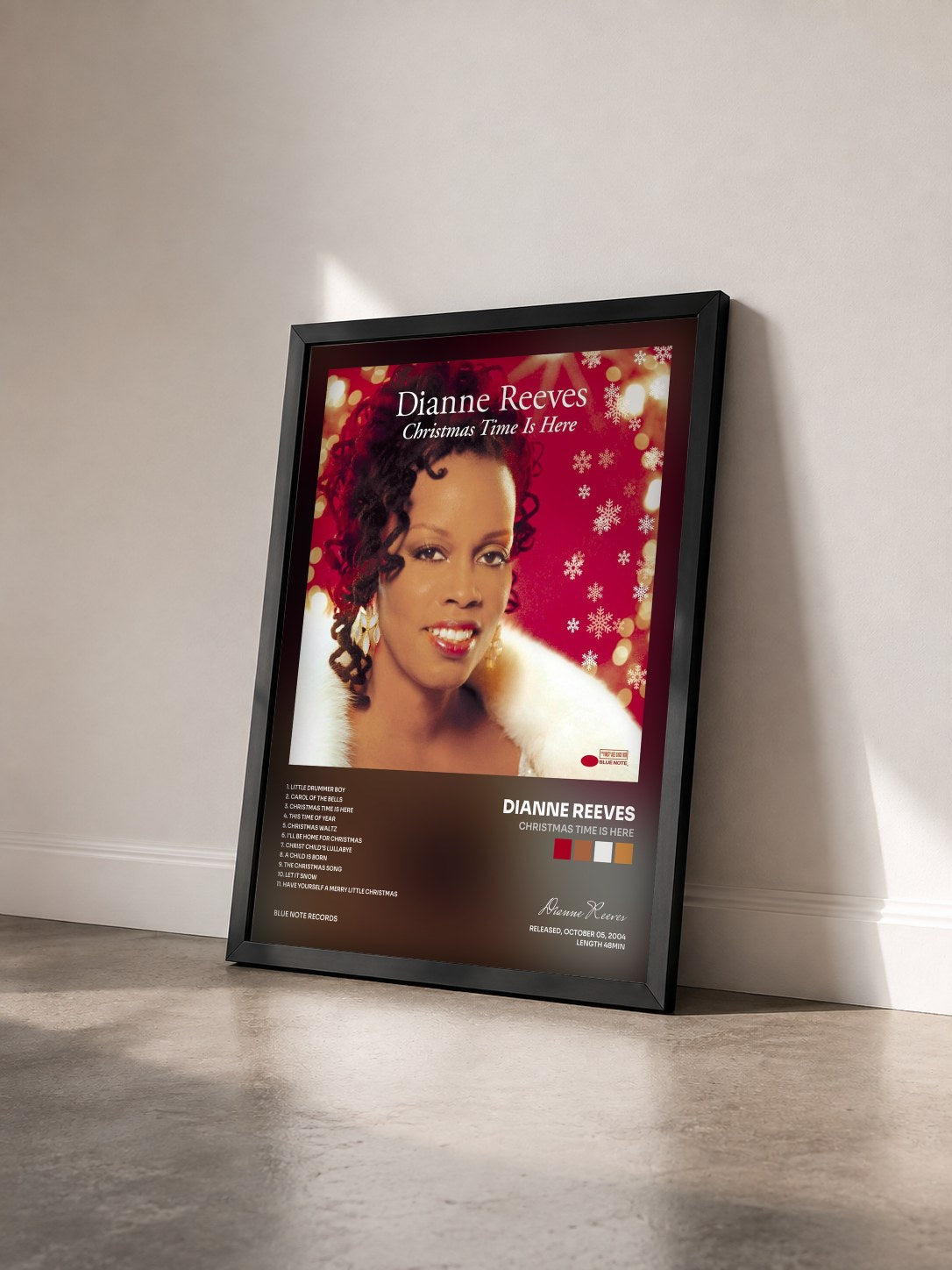 #noir Tableau de l'album Christmas Time Is Here de Dianne Reeves vu de trois quarts, cadre noir