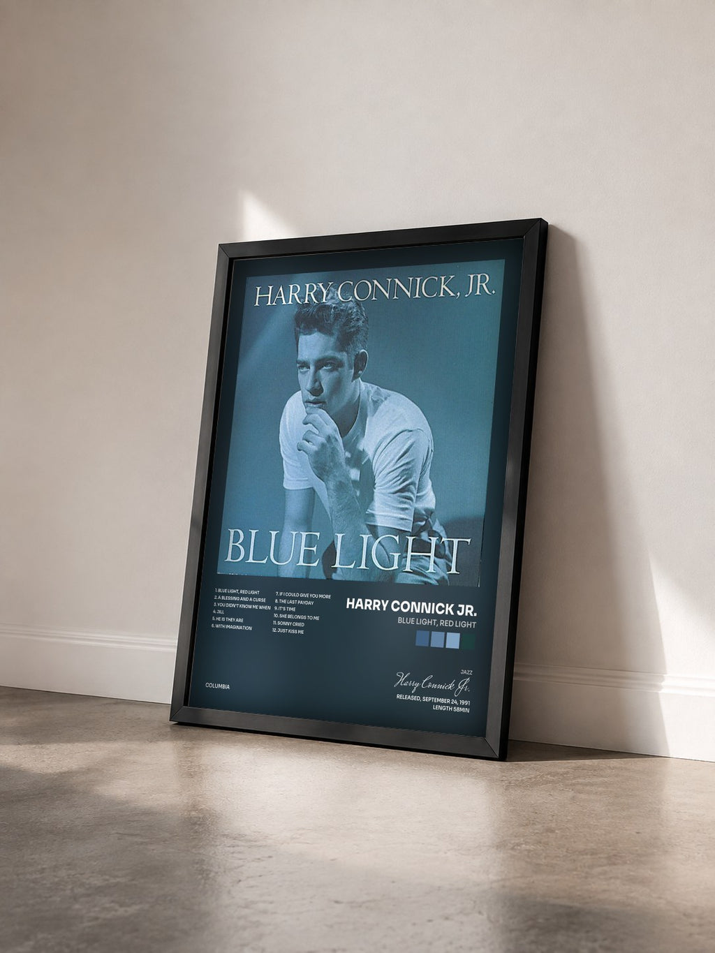 #noir Tableau de l'album Blue Light, Red Light de Harry Connick Jr. vu de trois quarts, cadre noir