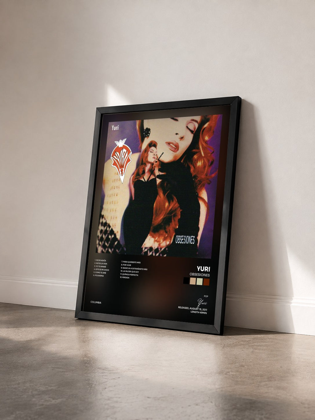 #noir Tableau de l'album Obsesiones de Yuri vu de trois quarts, cadre noir
