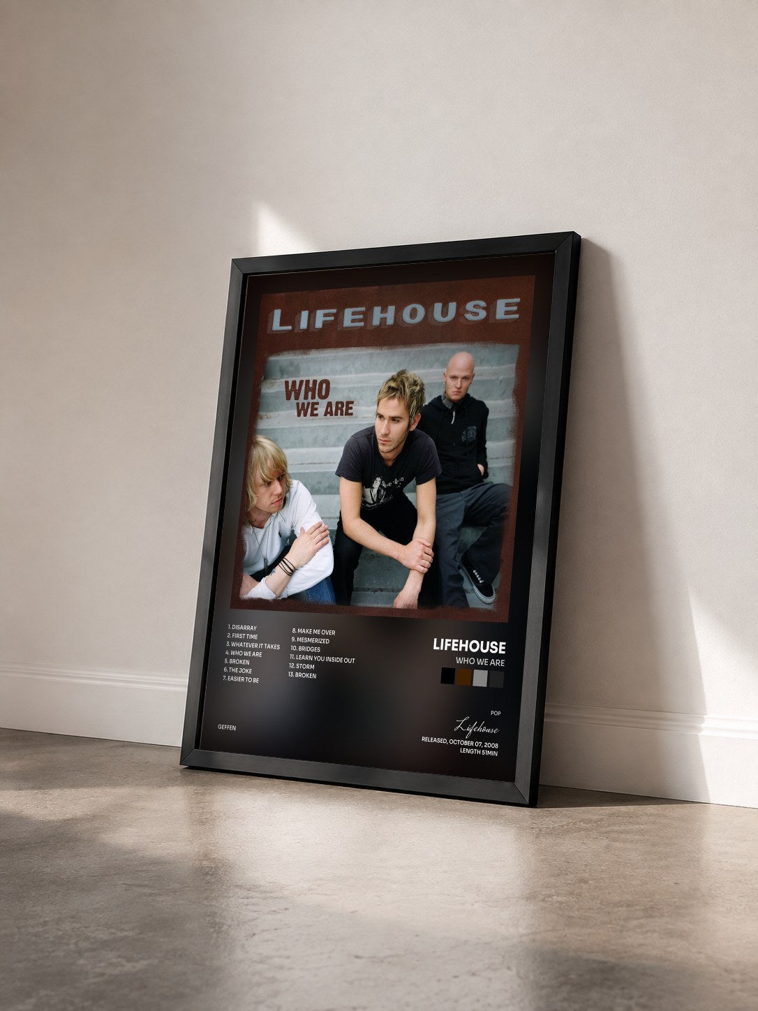 #noir Tableau de l'album Who We Are de Lifehouse vu de trois quarts, cadre noir