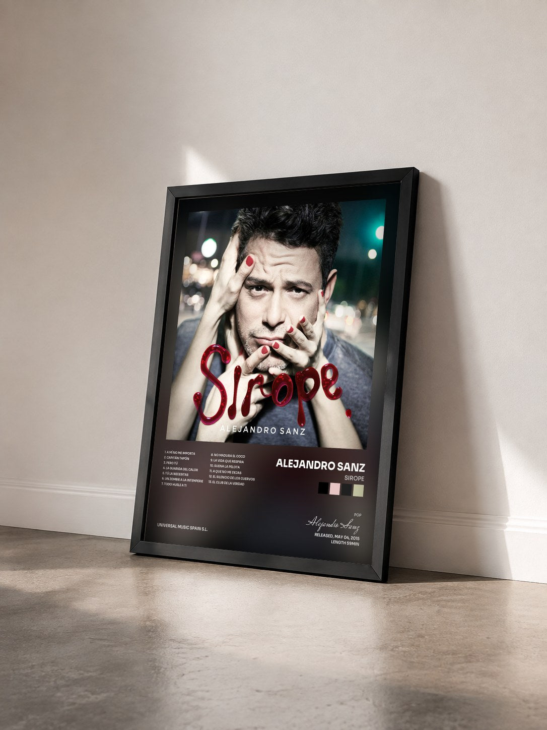#noir Tableau de l'album Sirope de Alejandro Sanz vu de trois quarts, cadre noir