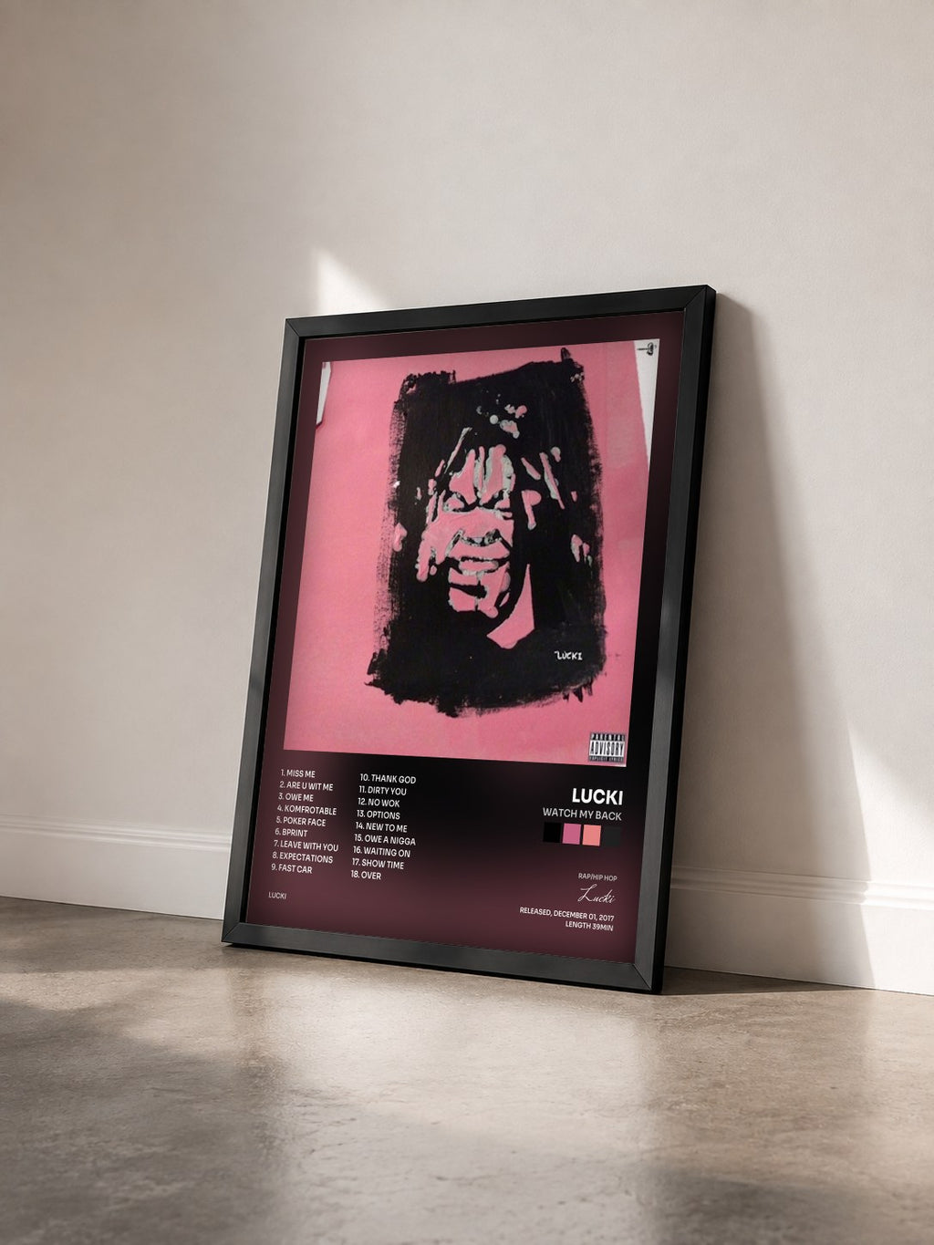 #noir Tableau de l'album Watch My Back de Lucki vu de trois quarts, cadre noir
