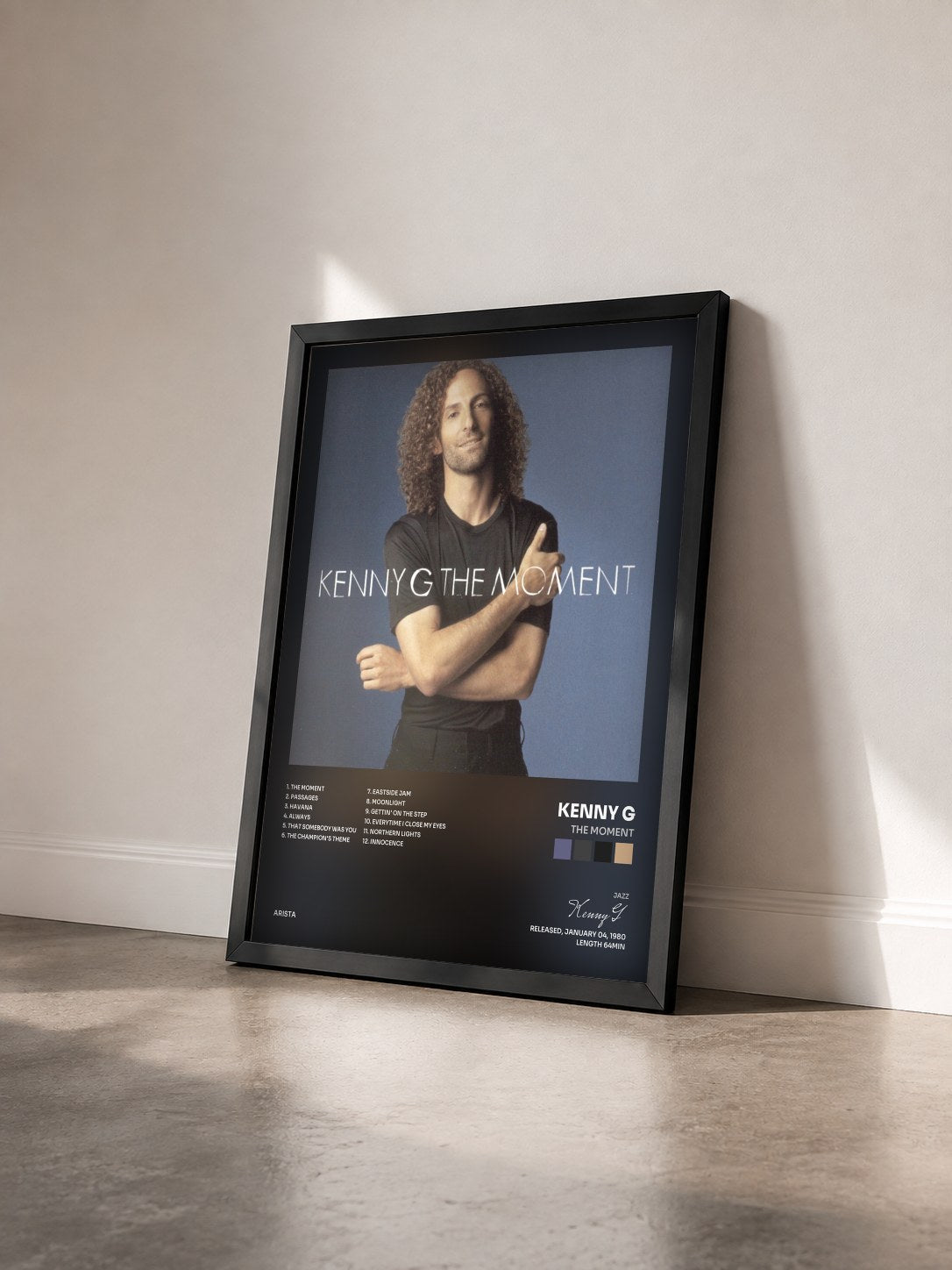 #noir Tableau de l'album The Moment de Kenny G vu de trois quarts, cadre noir