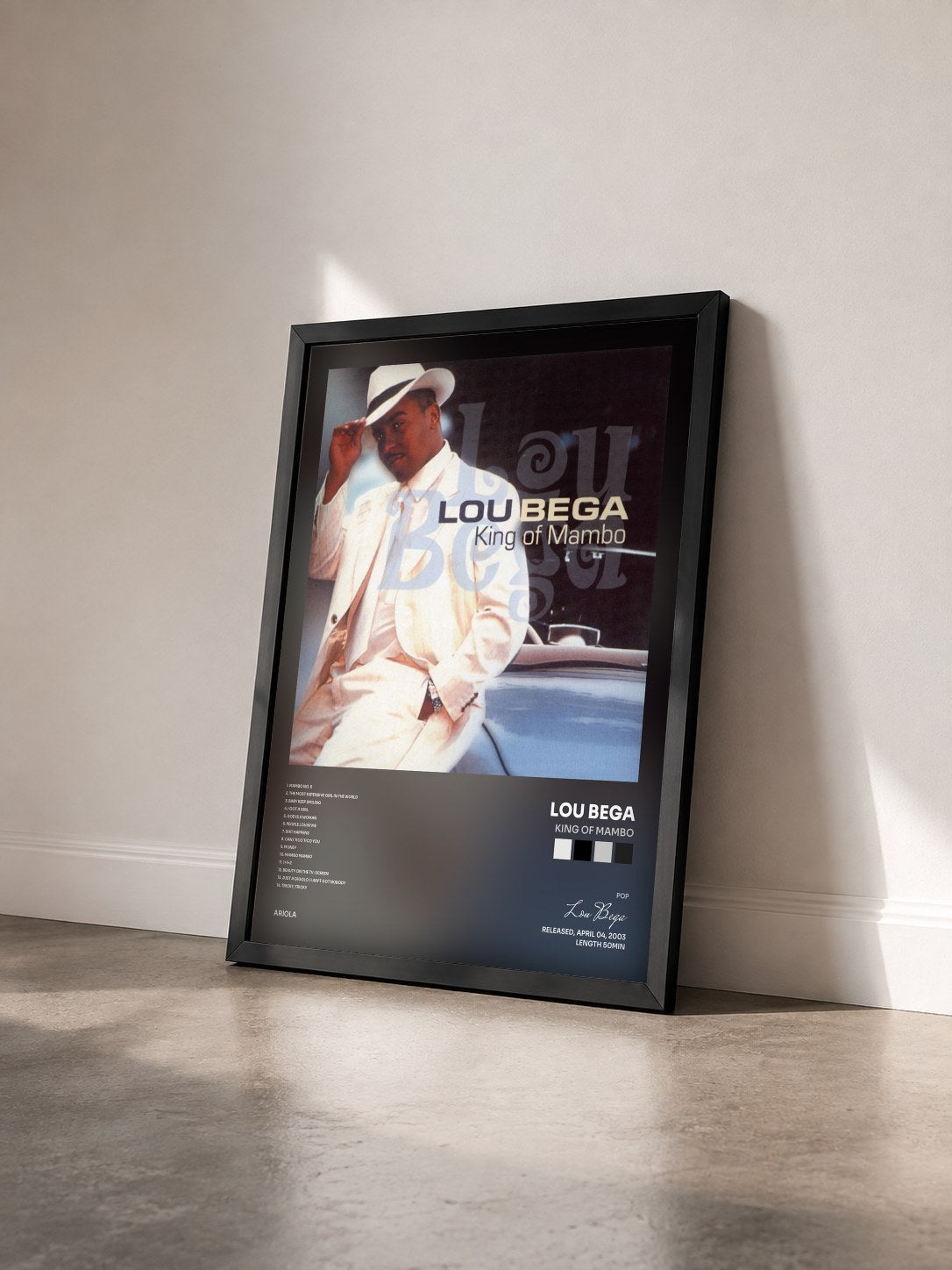 #noir Tableau de l'album King Of Mambo de Lou Bega vu de trois quarts, cadre noir