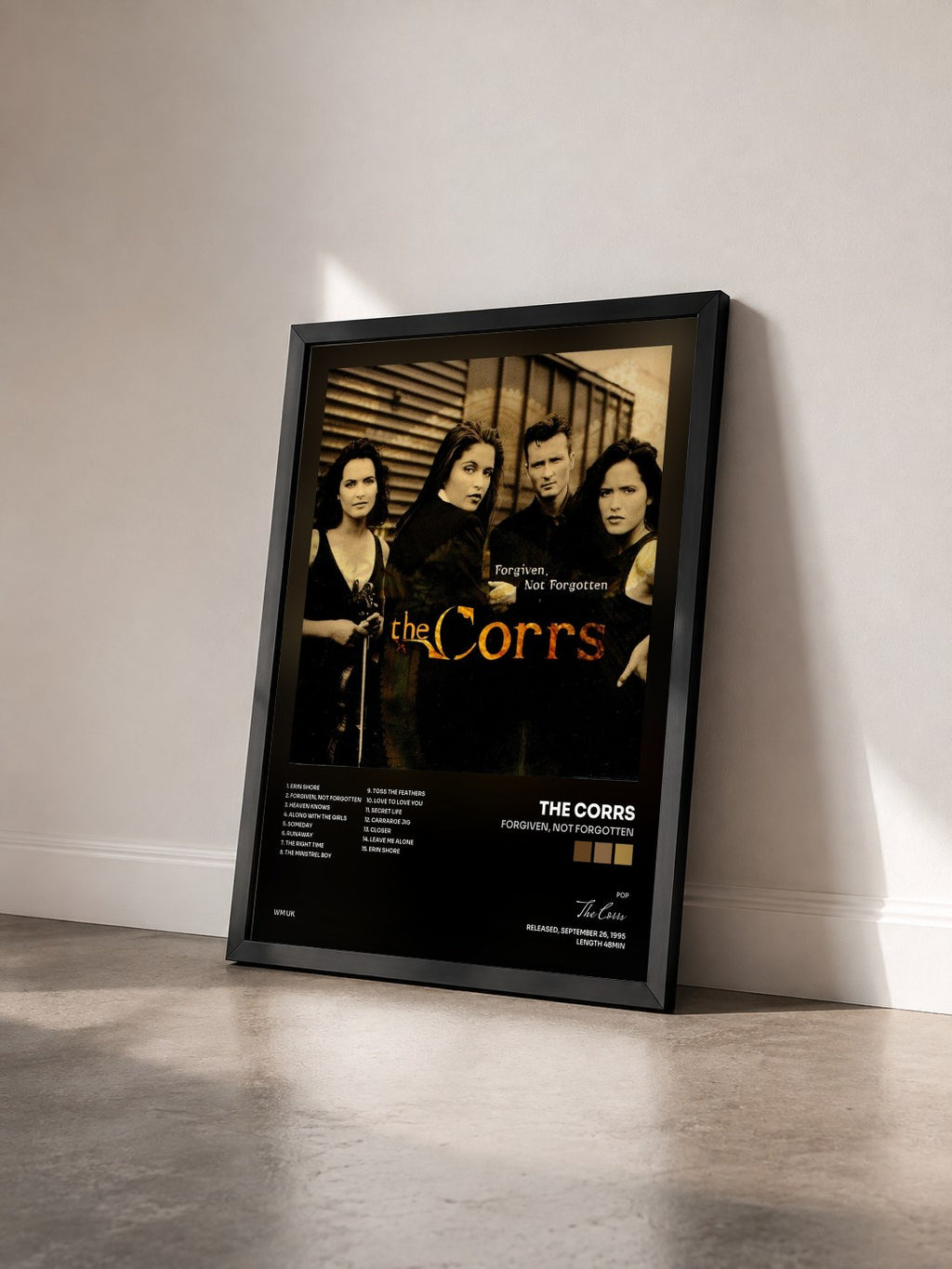 #noir Tableau de l'album Forgiven, Not Forgotten de The Corrs vu de trois quarts, cadre noir