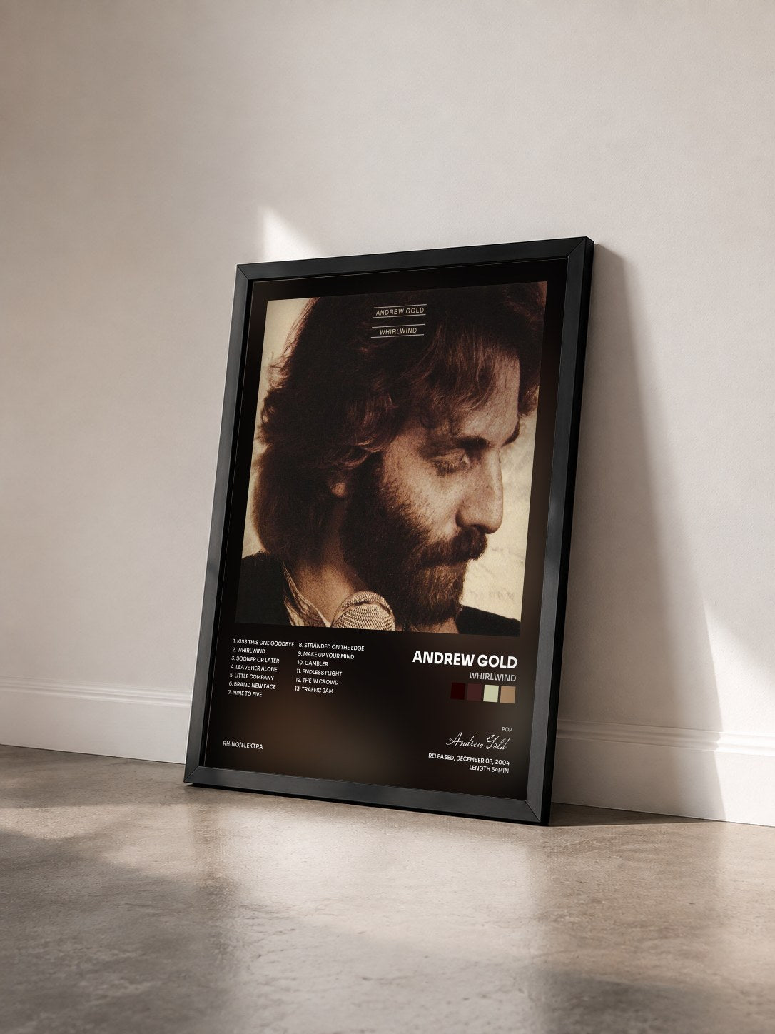 #noir Tableau de l'album Whirlwind de Andrew Gold vu de trois quarts, cadre noir