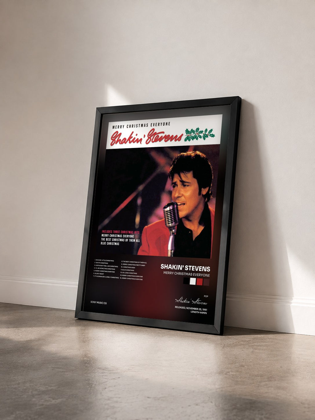 #noir Tableau de l'album Merry Christmas Everyone de Shakin' Stevens vu de trois quarts, cadre noir