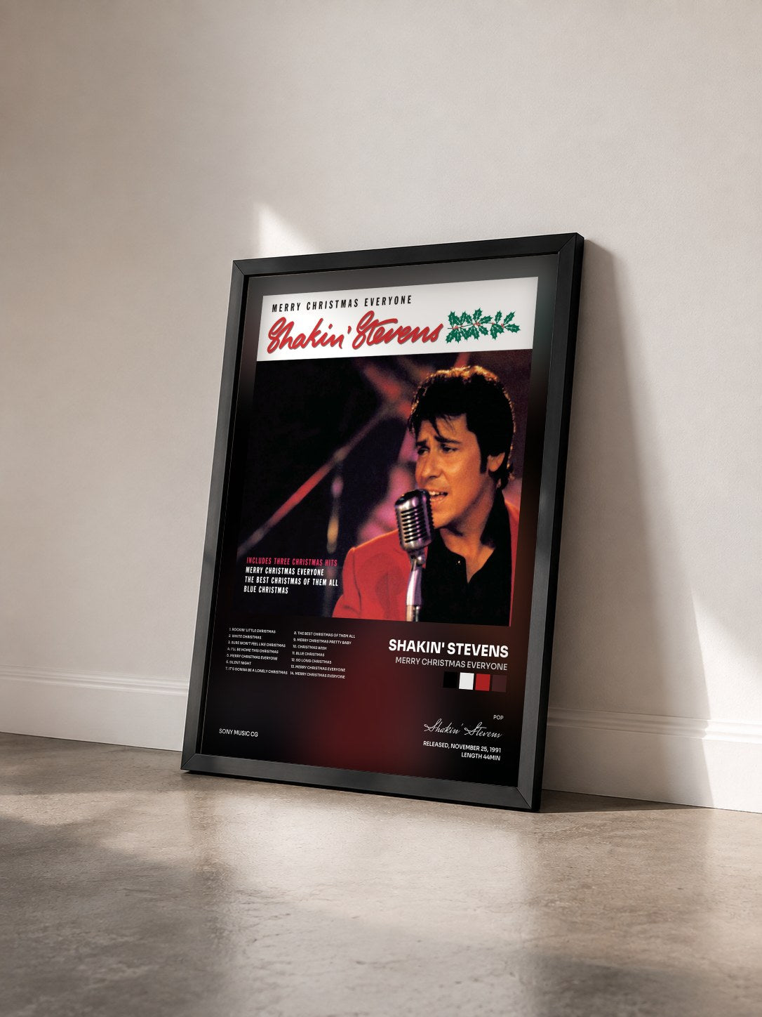 #noir Tableau de l'album Merry Christmas Everyone de Shakin' Stevens vu de trois quarts, cadre noir