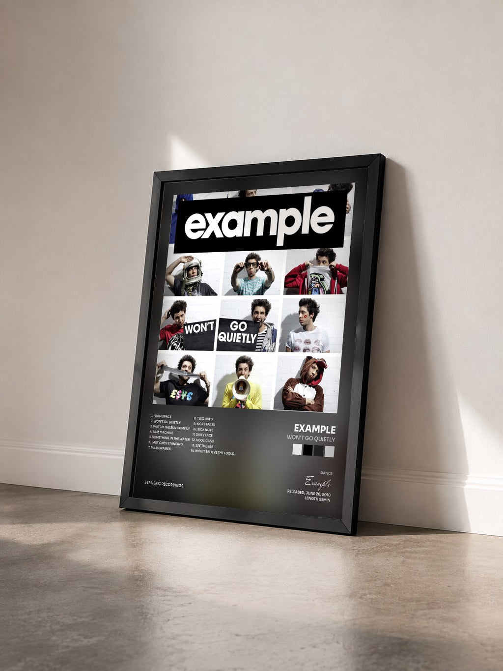 #noir Tableau de l'album Won't Go Quietly de Example vu de trois quarts, cadre noir