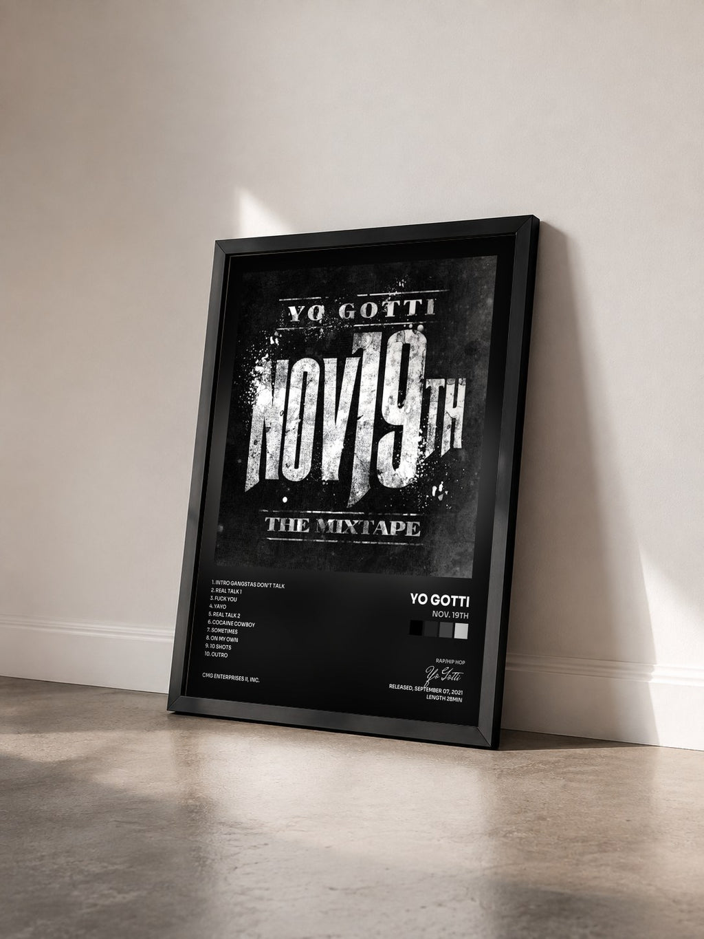 #noir Tableau de l'album Nov. 19th de Yo Gotti vu de trois quarts, cadre noir
