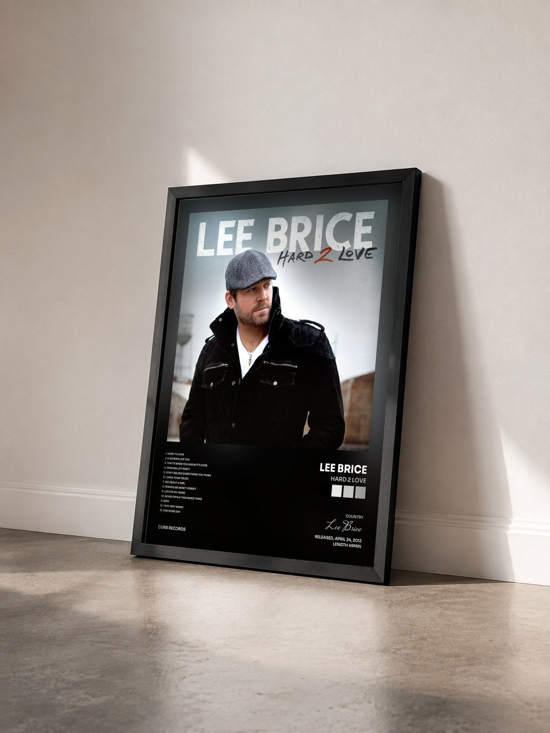 #noir Tableau de l'album Hard 2 Love de Lee Brice vu de trois quarts, cadre noir