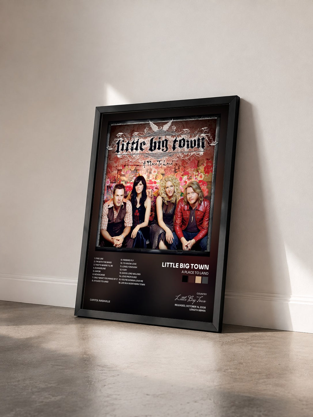 #noir Tableau de l'album A Place To Land de Little Big Town vu de trois quarts, cadre noir