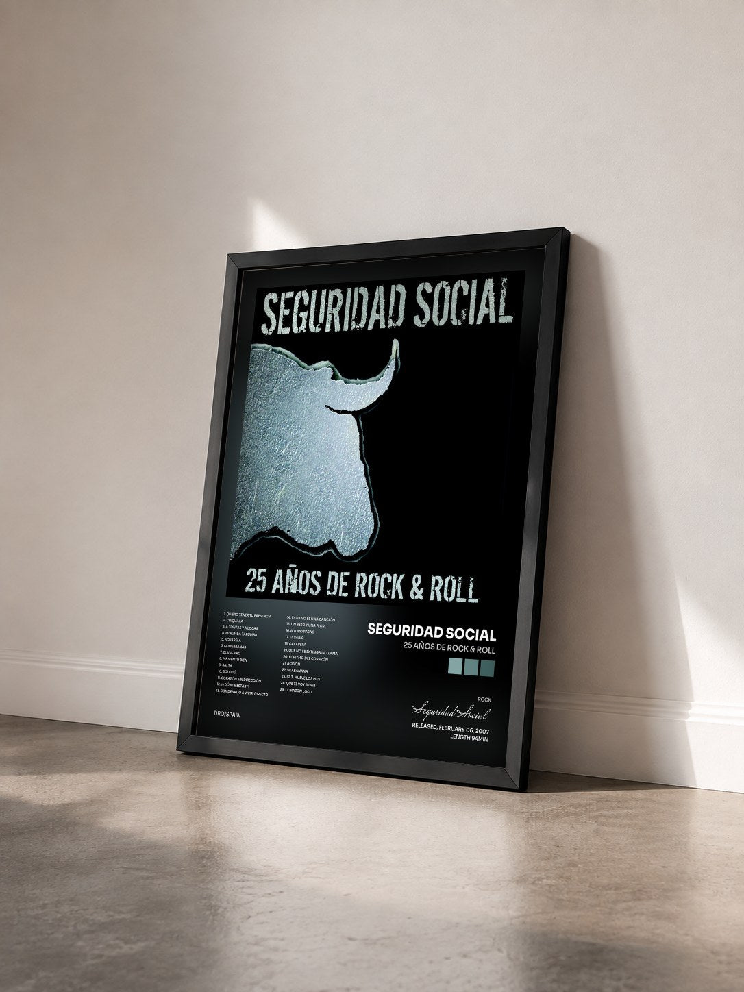 #noir Tableau de l'album 25 años de Rock & Roll de Seguridad Social vu de trois quarts, cadre noir