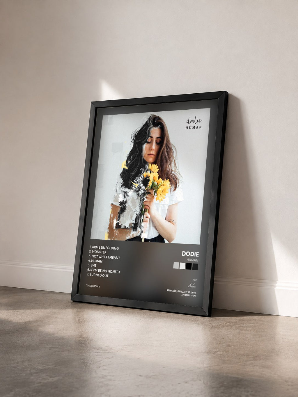 #noir Tableau de l'album Human de dodie vu de trois quarts, cadre noir