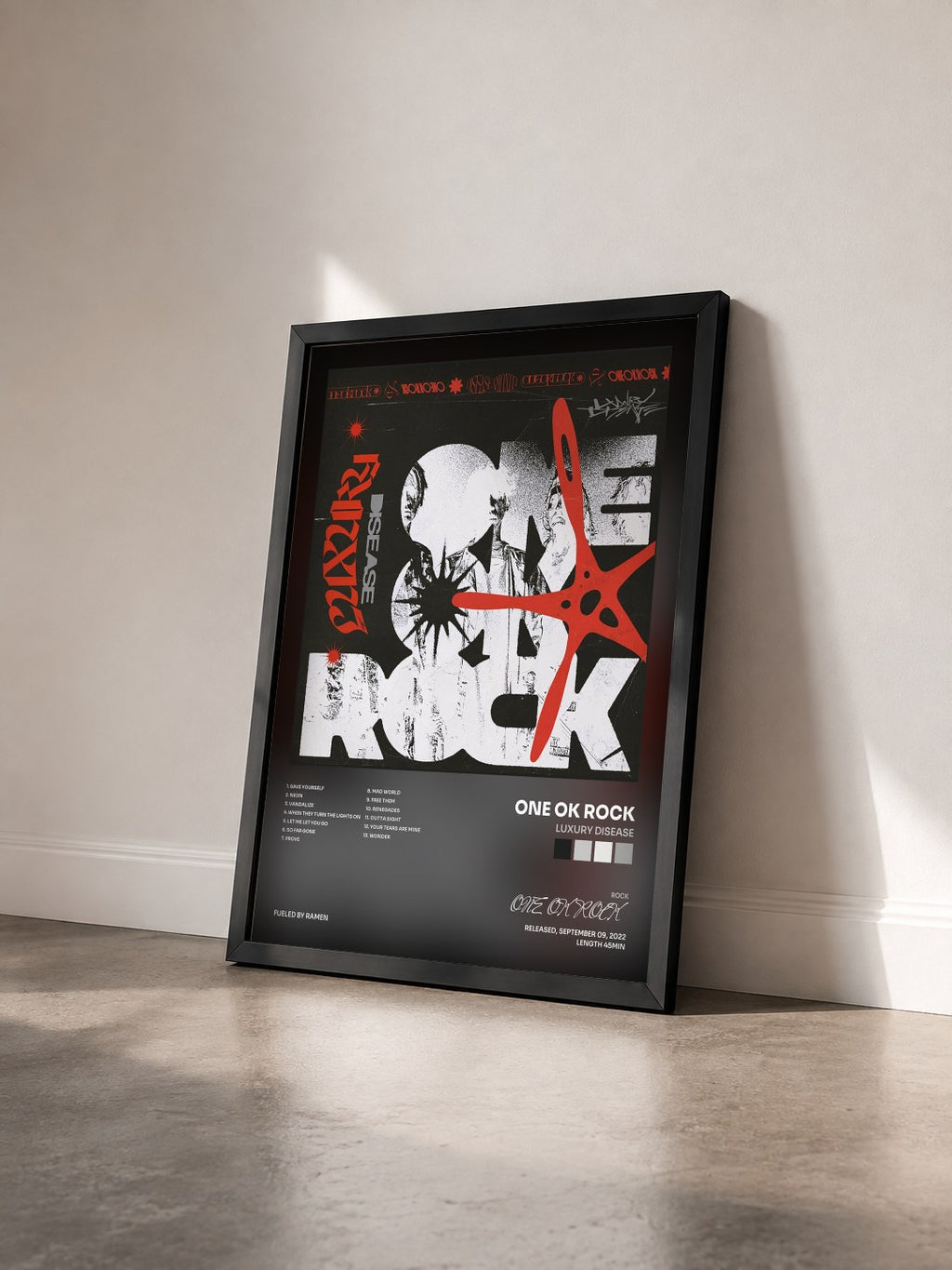 #noir Tableau de l'album Luxury Disease de ONE OK ROCK vu de trois quarts, cadre noir