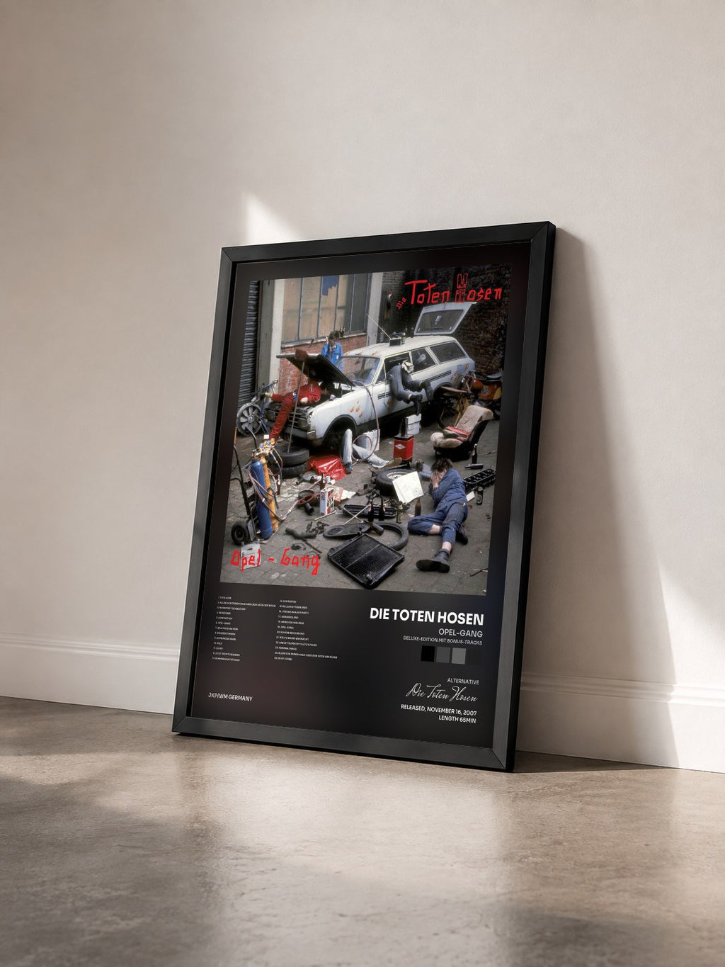 #noir Tableau de l'album Opel-Gang (Deluxe-Edition mit Bonus-Tracks) de Die Toten Hosen vu de trois quarts, cadre noir