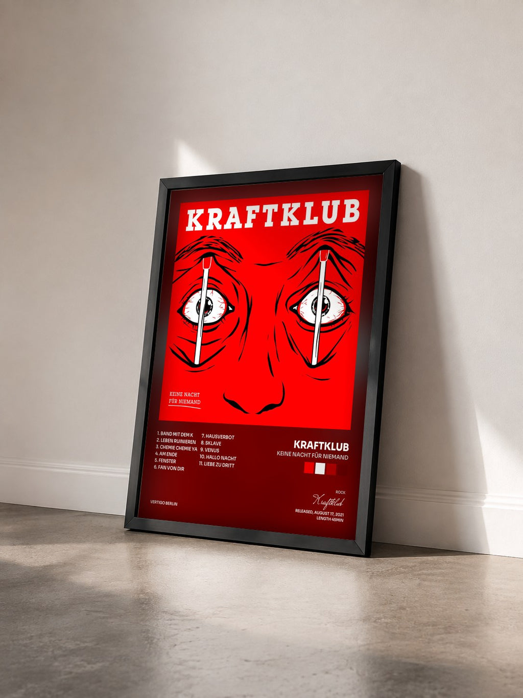 #noir Tableau de l'album Keine Nacht für Niemand de Kraftklub vu de trois quarts, cadre noir