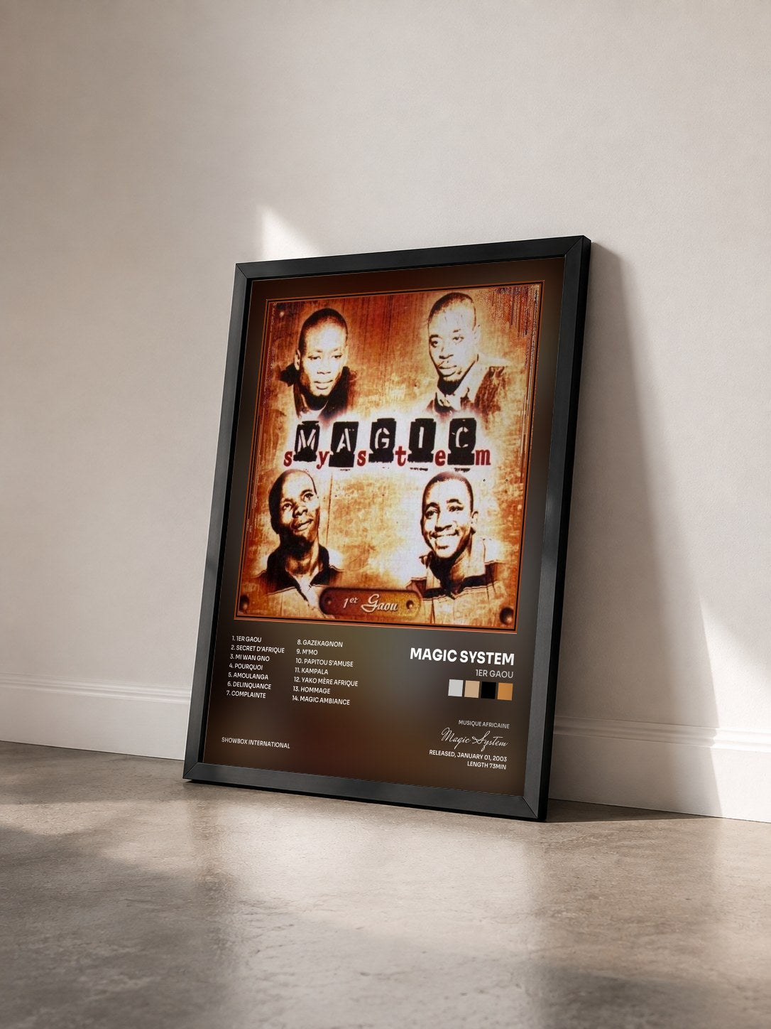 #noir Tableau de l'album 1er Gaou de Magic System vu de trois quarts, cadre noir