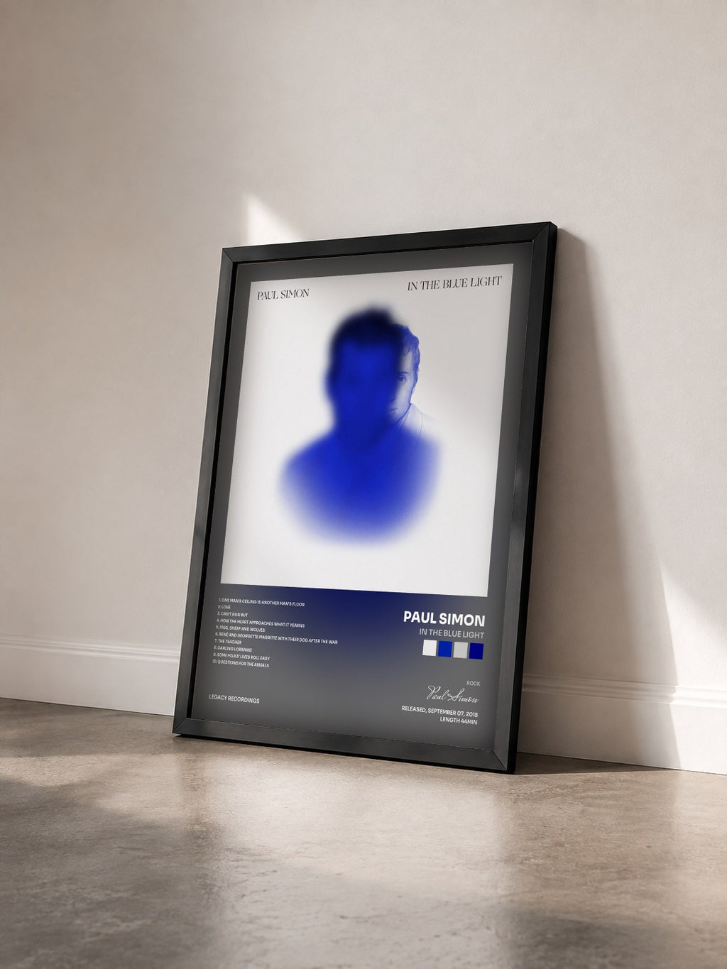 #noir Tableau de l'album In the Blue Light de Paul Simon vu de trois quarts, cadre noir