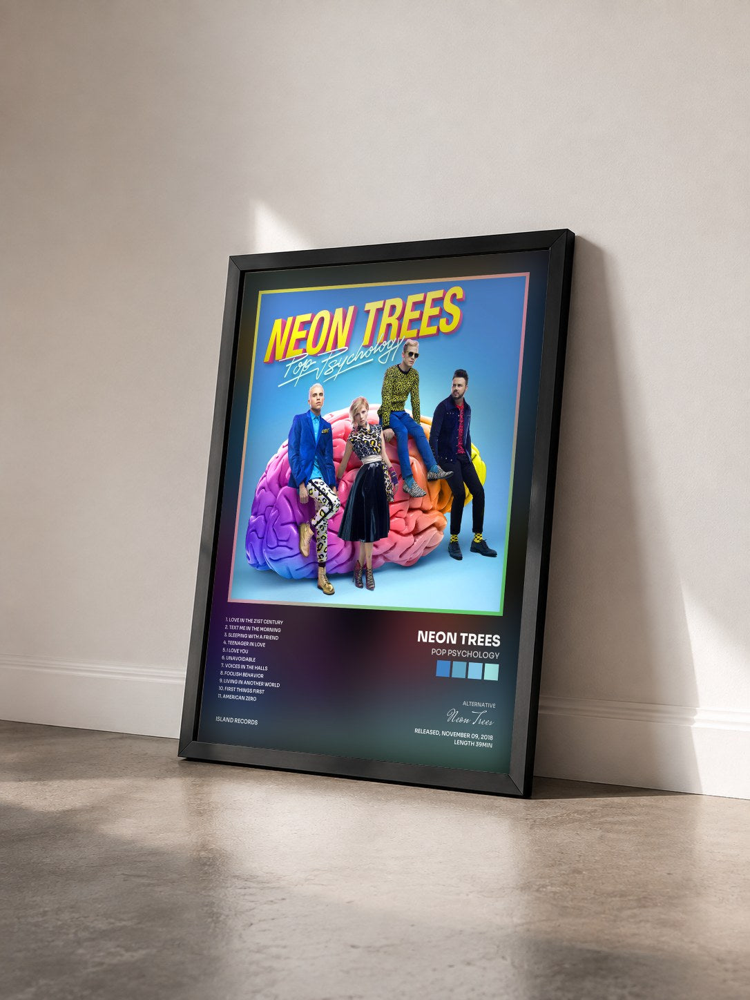#noir Tableau de l'album Pop Psychology de Neon Trees vu de trois quarts, cadre noir