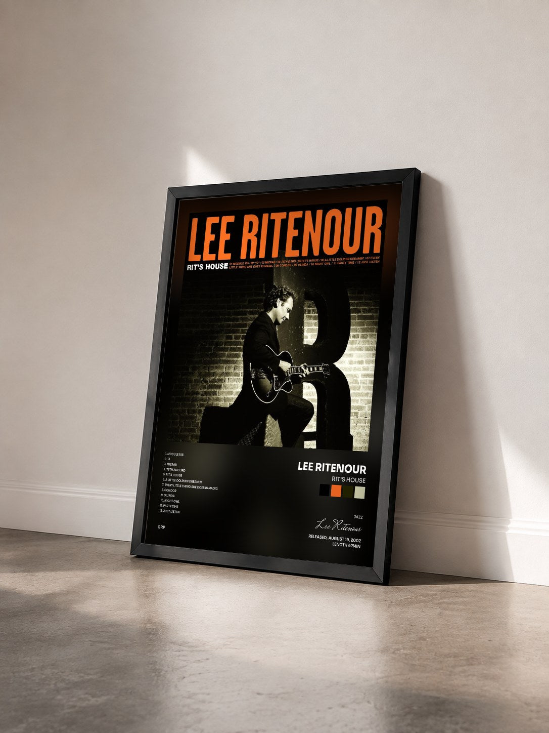 #noir Tableau de l'album Rit's House de Lee Ritenour vu de trois quarts, cadre noir