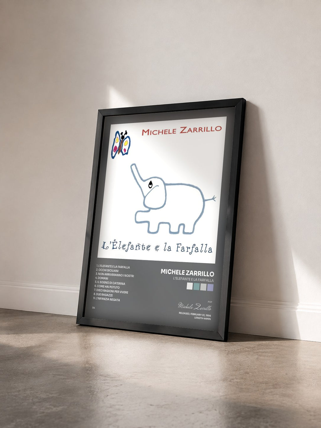 #noir Tableau de l'album L'Elefante E La Farfalla de Michele Zarrillo vu de trois quarts, cadre noir