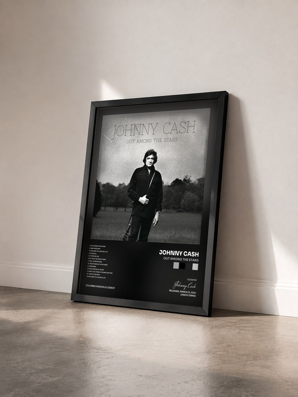 #noir Tableau de l'album Out Among The Stars de Johnny Cash vu de trois quarts, cadre noir