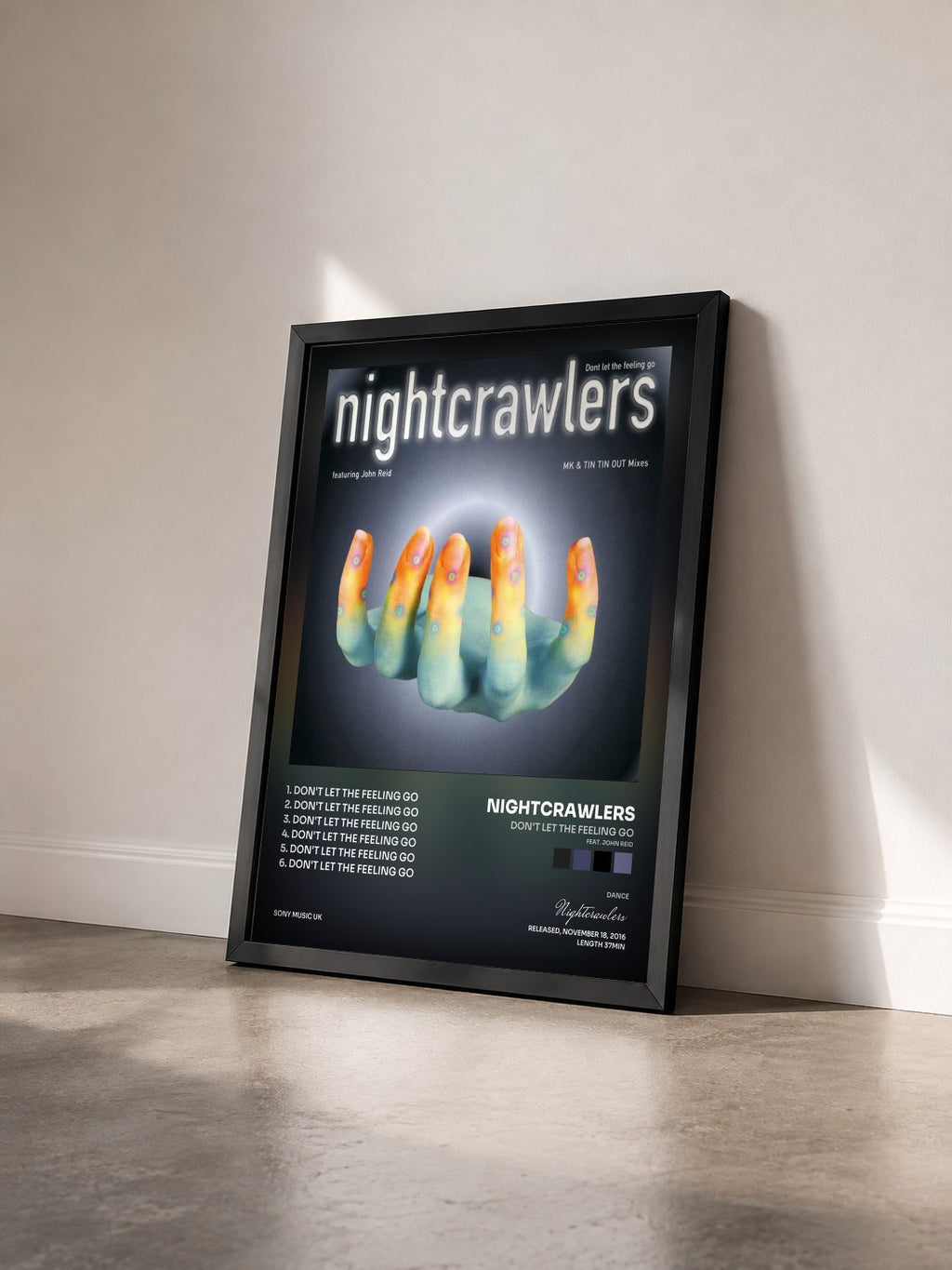 #noir Tableau de l'album Don't Let the Feeling Go (feat. John Reid) de Nightcrawlers vu de trois quarts, cadre noir
