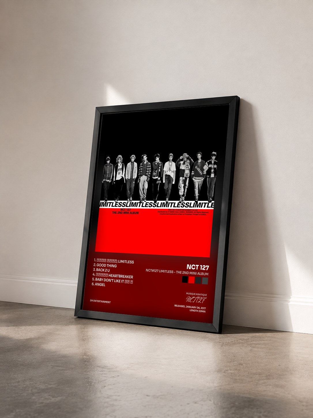 #noir Tableau de l'album NCT#127 LIMITLESS - The 2nd Mini Album de NCT 127 vu de trois quarts, cadre noir