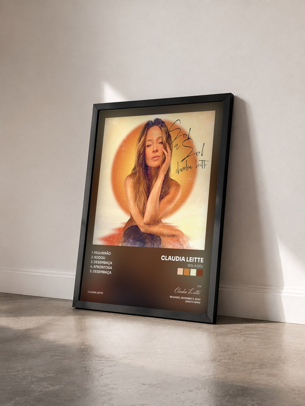 #noir Tableau de l'album Sol a Sol de Claudia Leitte vu de trois quarts, cadre noir