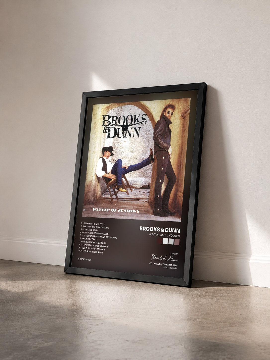 #noir Tableau de l'album Waitin' On Sundown de Brooks & Dunn vu de trois quarts, cadre noir