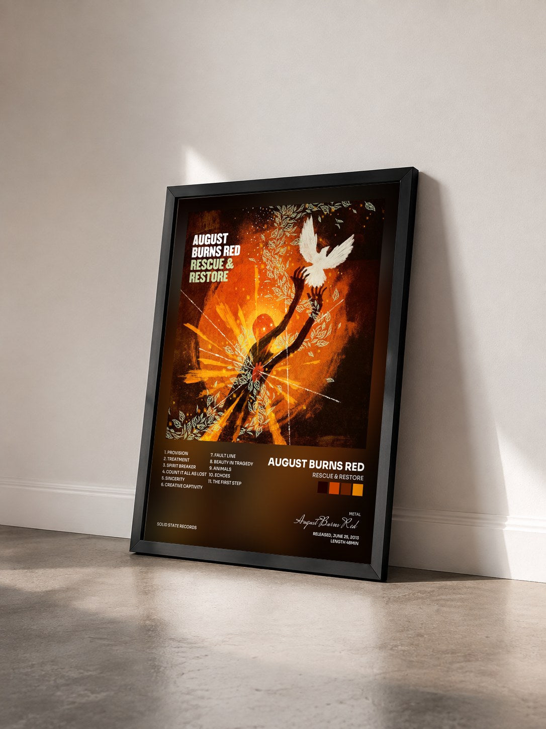 #noir Tableau de l'album Rescue & Restore de August Burns Red vu de trois quarts, cadre noir