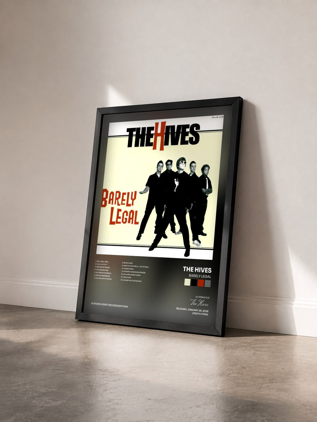 #noir Tableau de l'album Barely Legal de The Hives vu de trois quarts, cadre noir