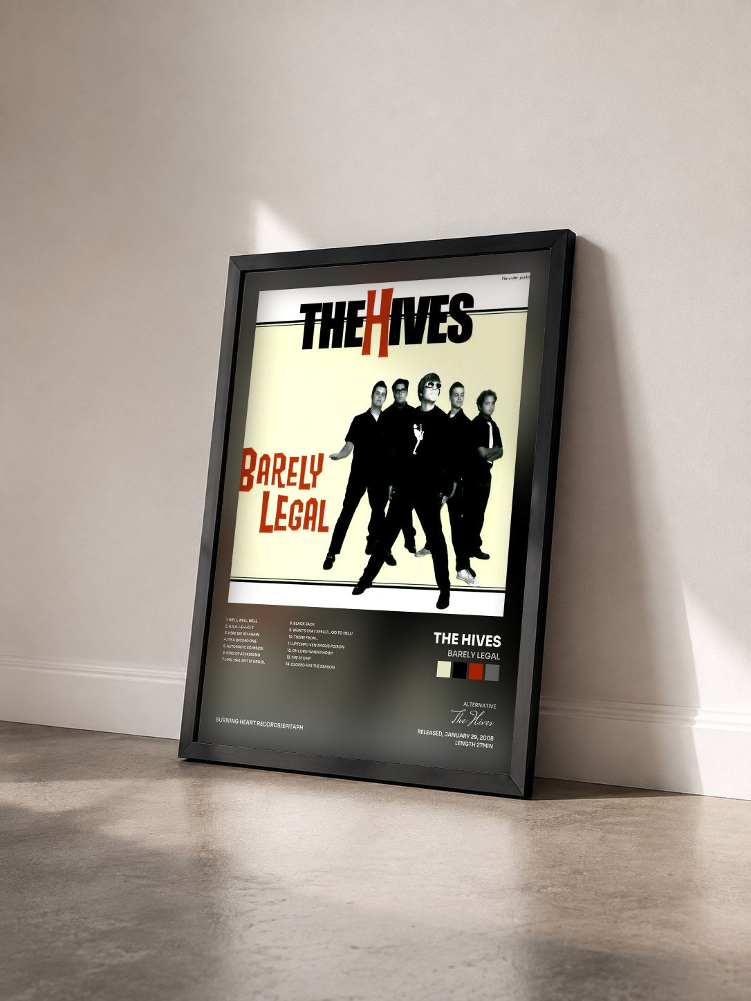 #noir Tableau de l'album Barely Legal de The Hives vu de trois quarts, cadre noir