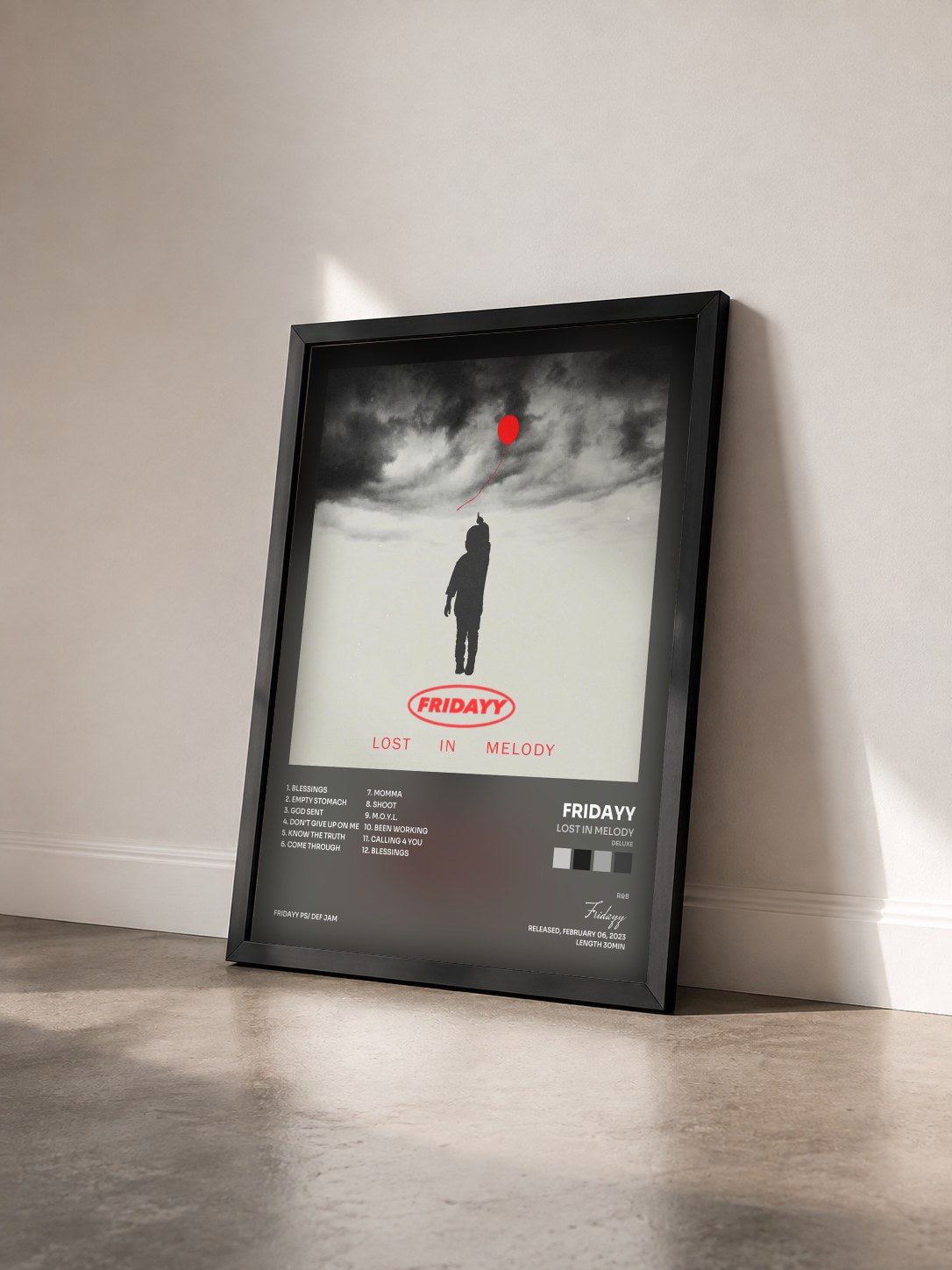 #noir Tableau de l'album Lost In Melody (Deluxe) de Fridayy vu de trois quarts, cadre noir