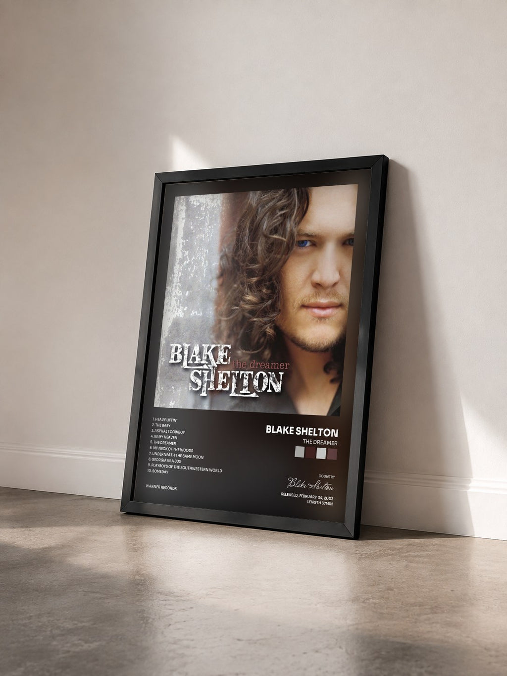 #noir Tableau de l'album The Dreamer de Blake Shelton vu de trois quarts, cadre noir