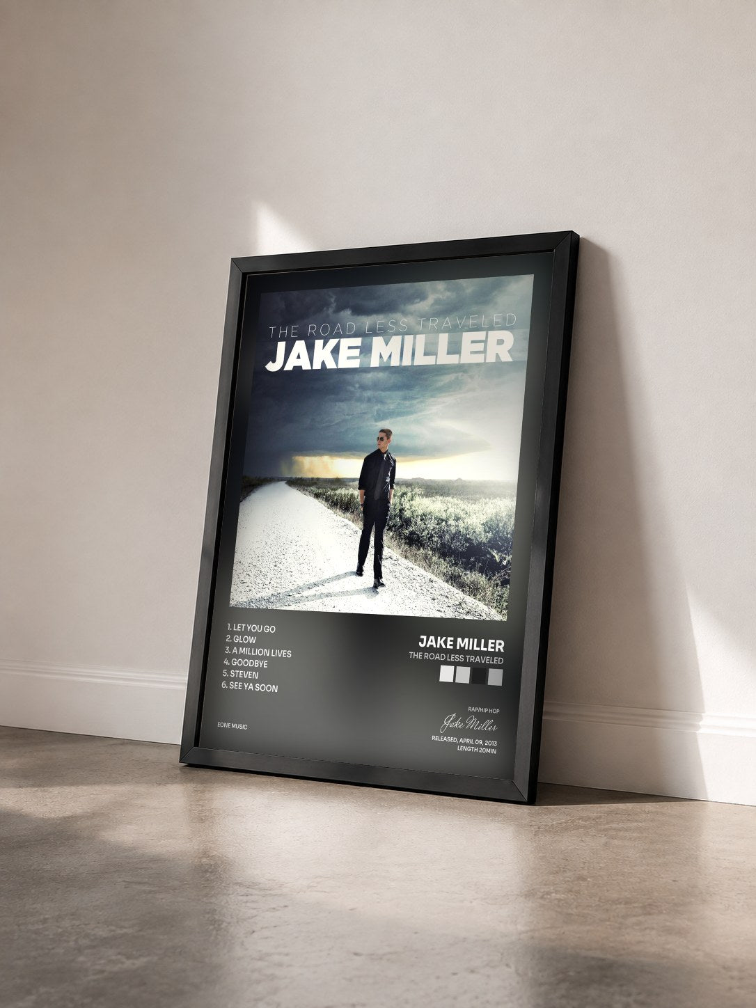 #noir Tableau de l'album The Road Less Traveled de Jake Miller vu de trois quarts, cadre noir