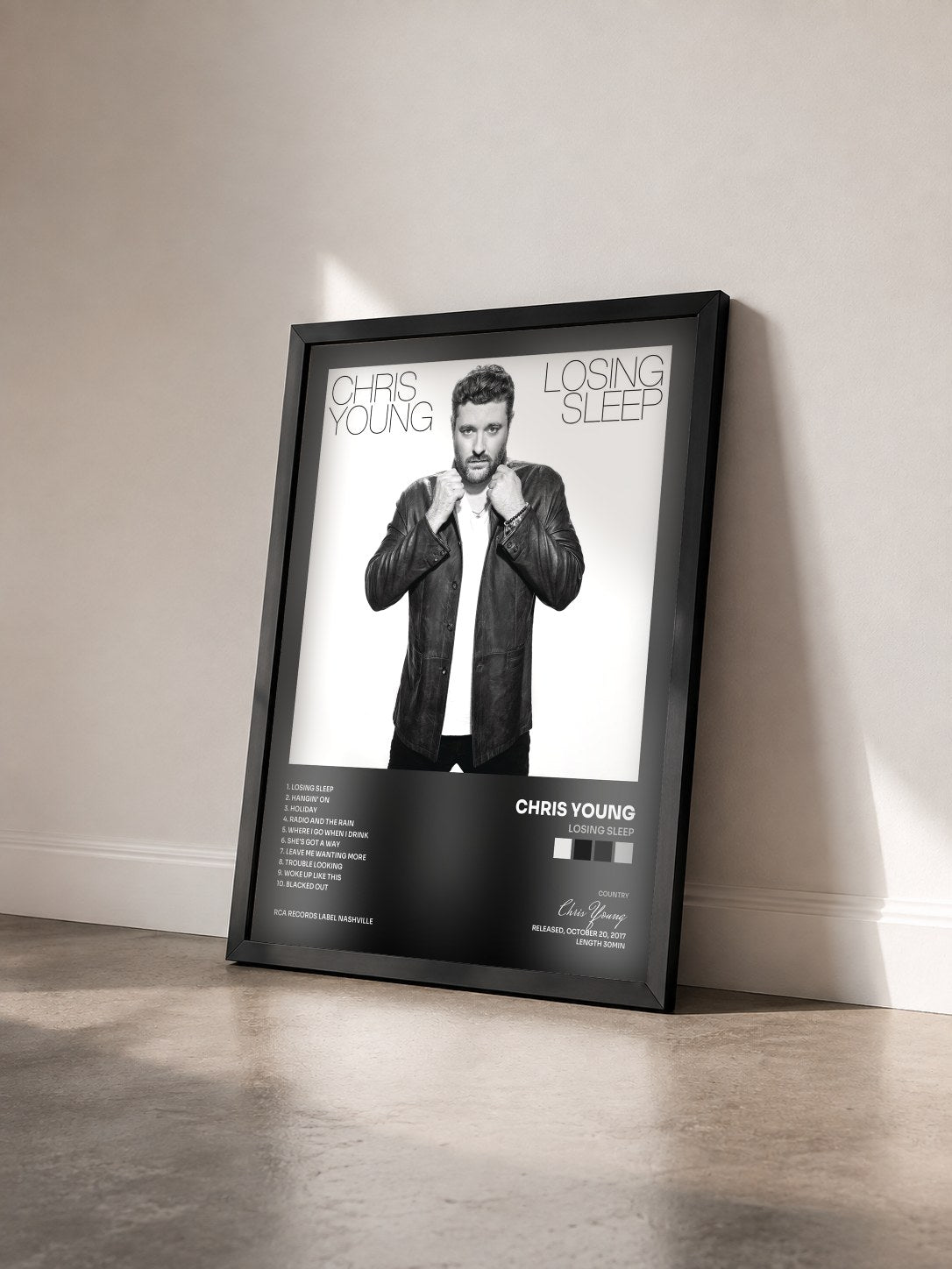 #noir Tableau de l'album Losing Sleep de Chris Young vu de trois quarts, cadre noir
