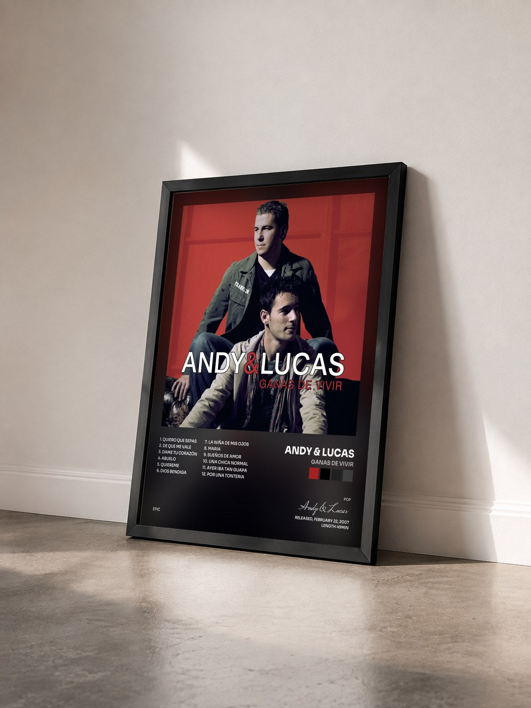 #noir Tableau de l'album Ganas De Vivir de Andy & Lucas vu de trois quarts, cadre noir