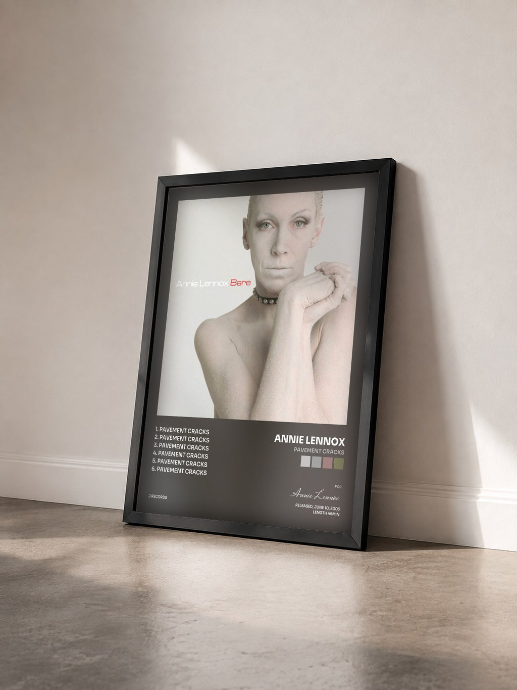 #noir Tableau de l'album Pavement Cracks de Annie Lennox vu de trois quarts, cadre noir
